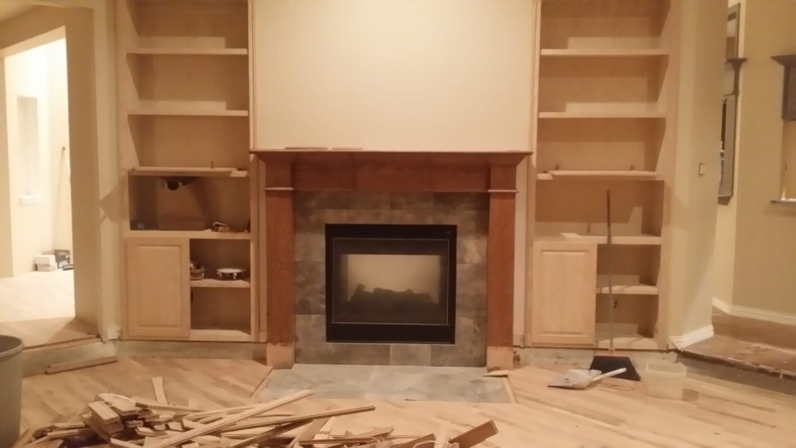 Fireplace surround and built-in shelving — 120 Buckingham Ln
