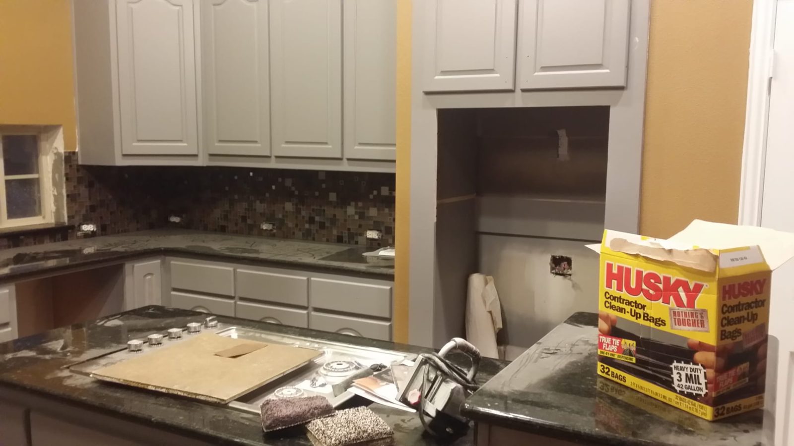 Kitchen tile backsplash in progress — 120 Buckingham Ln
