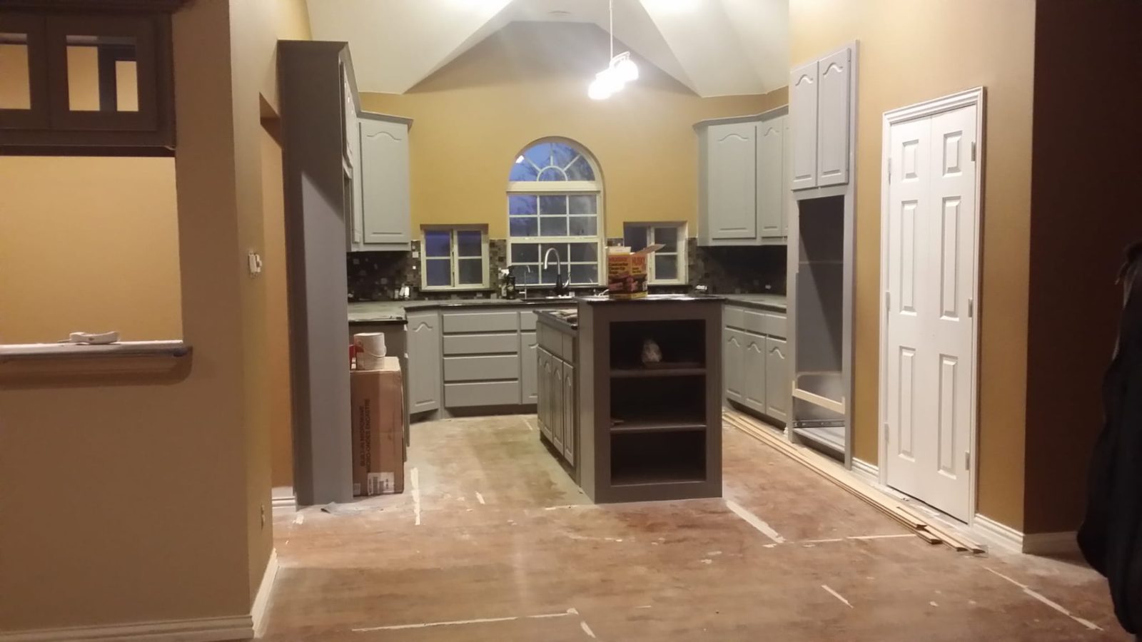 Kitchen with repainted cabinets and island — 120 Buckingham Ln