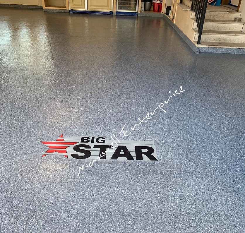 Garage flake floor with custom logo inlay